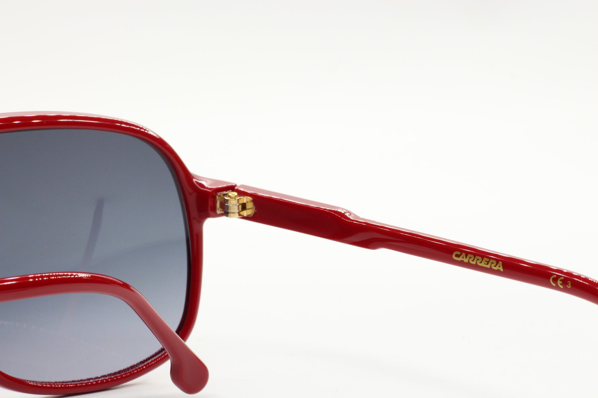 Red Carrera men's fashion eyewear optical frames by ABC Optical with sleek design
