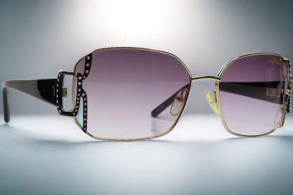 Caviar M2608 Austrian crystal sunglasses by ABC Optical with gold frame and gradient purple lenses