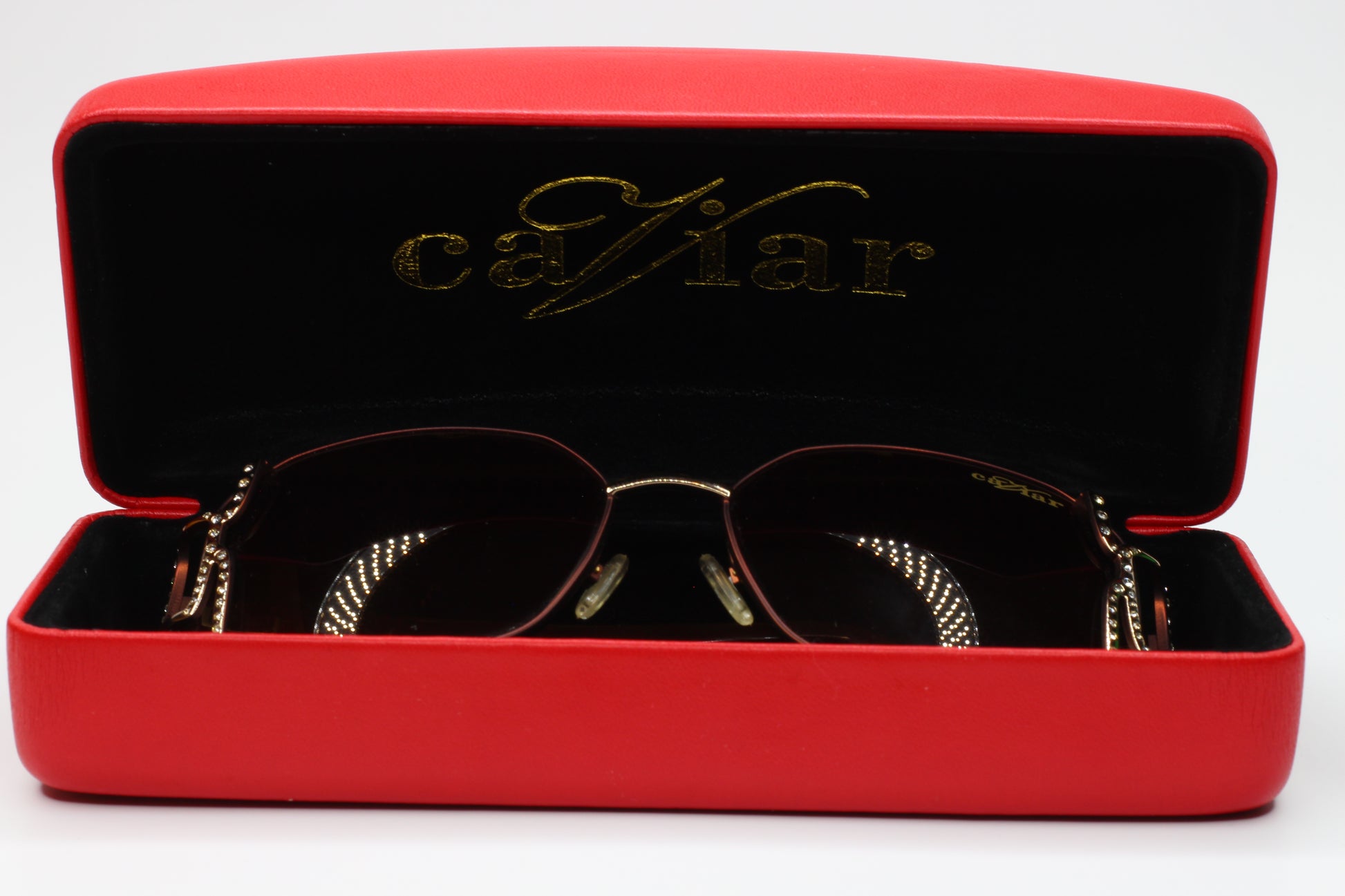 Caviar M2608 gold brown sunglasses optical frames in a red ABC Optical case