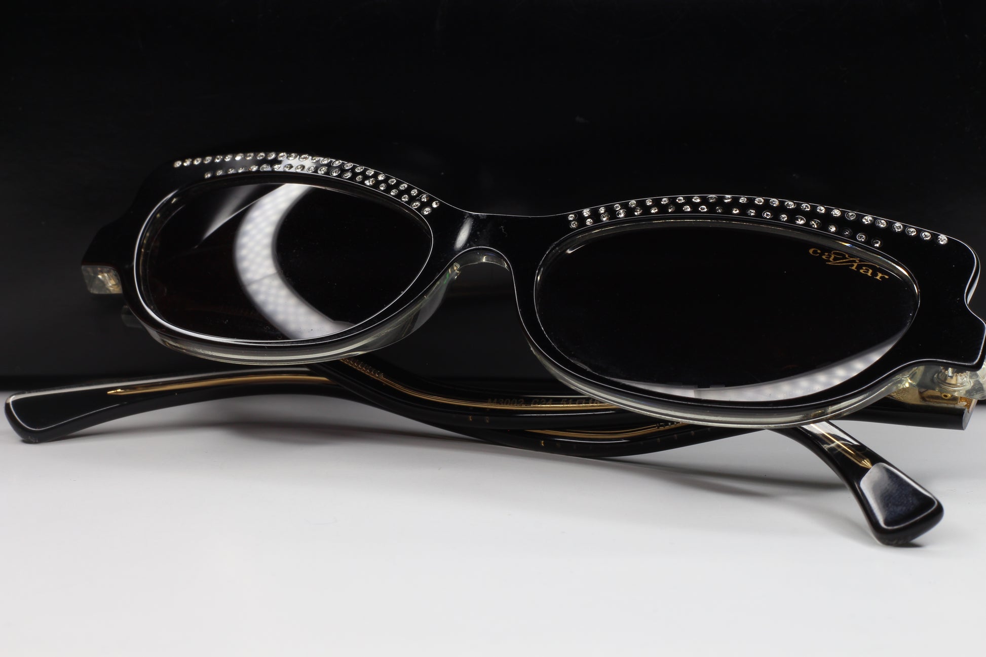ABC Optical Caviar M3002 Swarovski sunglasses with black frames and crystal detailing on top edges