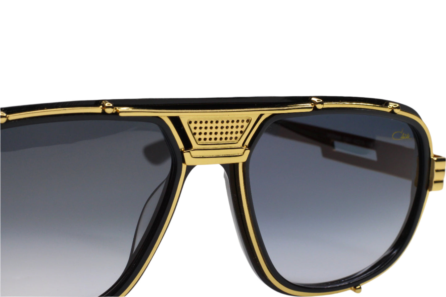 Close-up of Cazal 665 sunglasses black gold with black gradient lenses and gold detailing