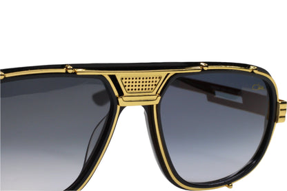 Close-up of Cazal 665 sunglasses black gold with black gradient lenses and gold detailing