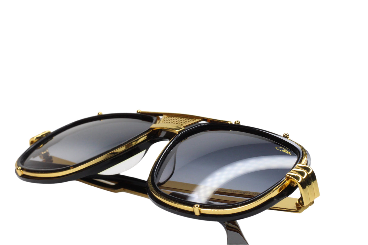 Cazal 665 sunglasses black gold optical frames with black lenses and gold accents by ABC Optical