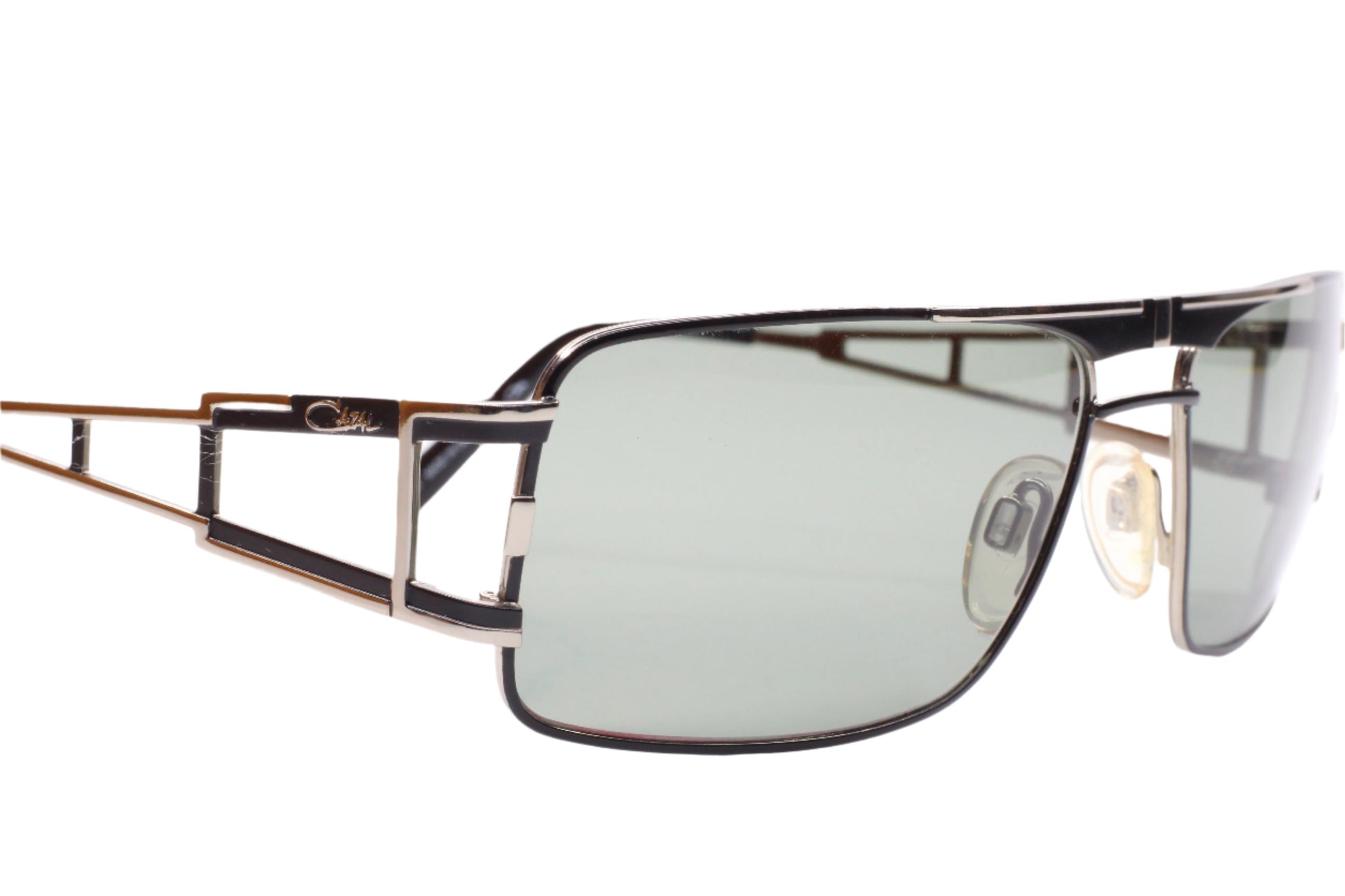 Close-up of Cazal 9043 black silver sunglasses with sleek metal optical frames by ABC Optical