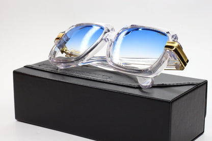 Cazal Legends sunglasses for sale with clear frames and blue gradient lenses on black box
