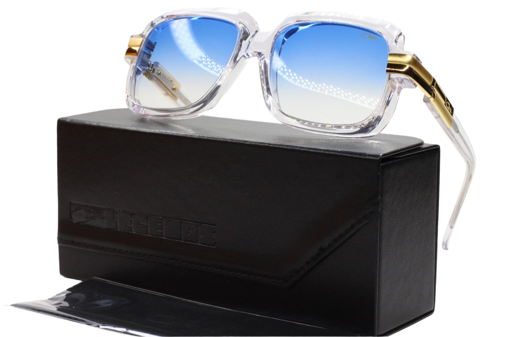 Cazal Legends sunglasses for sale with clear frames and blue gradient lenses displayed on a black case