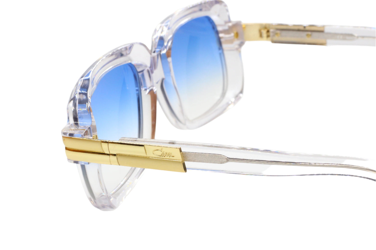 Clear frame Cazal Legends sunglasses for sale with blue gradient lenses and gold accents by ABC Optical