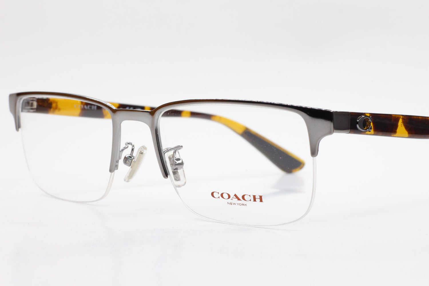 Men's Coach semi-rimless eyeglasses in tortoiseshell and silver from ABC Optical