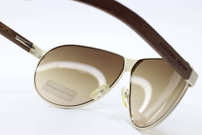 Designer Alexander McQueen AMQ4049S eyewear by ABC Optical with brown gradient lenses and wooden temples