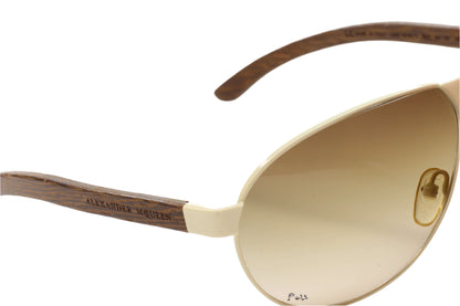 Close-up of designer Alexander McQueen AMQ4049S eyewear with beige frame and wooden textured temples