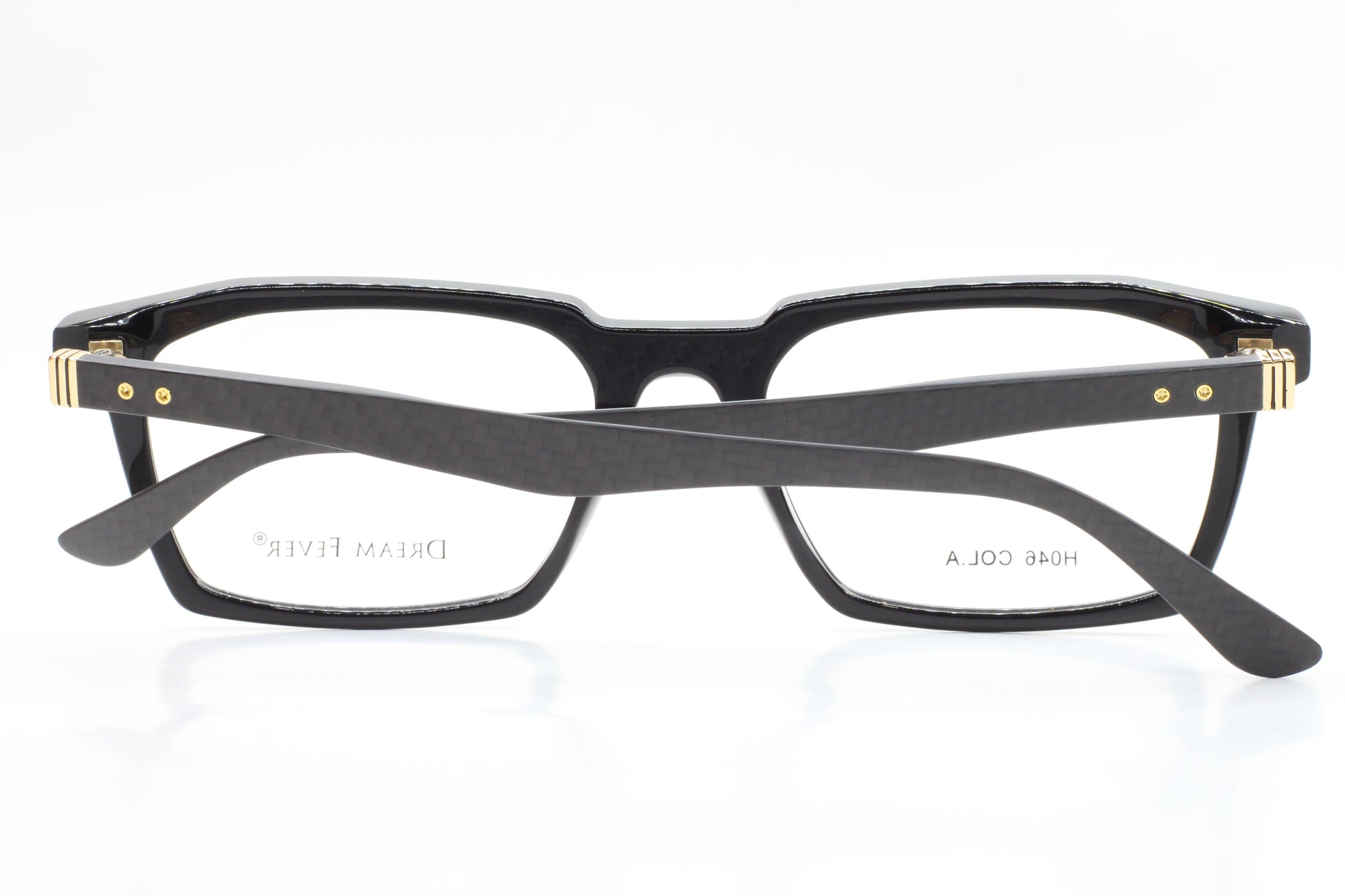 Black rectangular Dream Fever designer eyeglass frames by ABC Optical with gold accents