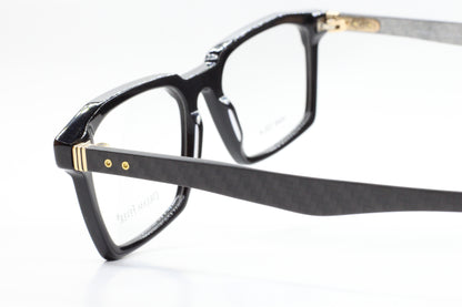 ABC Optical Dream Fever designer eyeglass frames in black with gold accents and sleek rectangular shape
