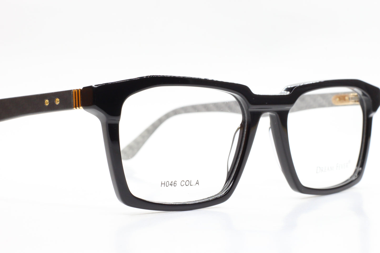 Close-up of ABC Optical black Dream Fever designer eyeglass frames with rectangular lenses