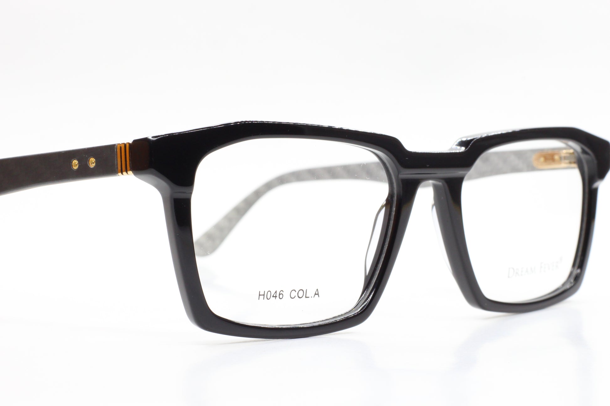 Close-up of ABC Optical black Dream Fever designer eyeglass frames with rectangular lenses