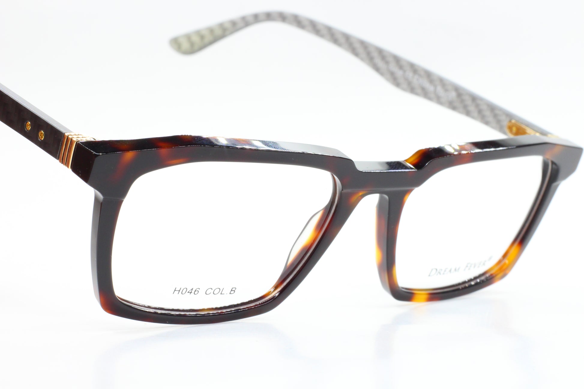 Dream Fever designer eyeglass frames by ABC Optical in tortoiseshell pattern with rectangular lenses