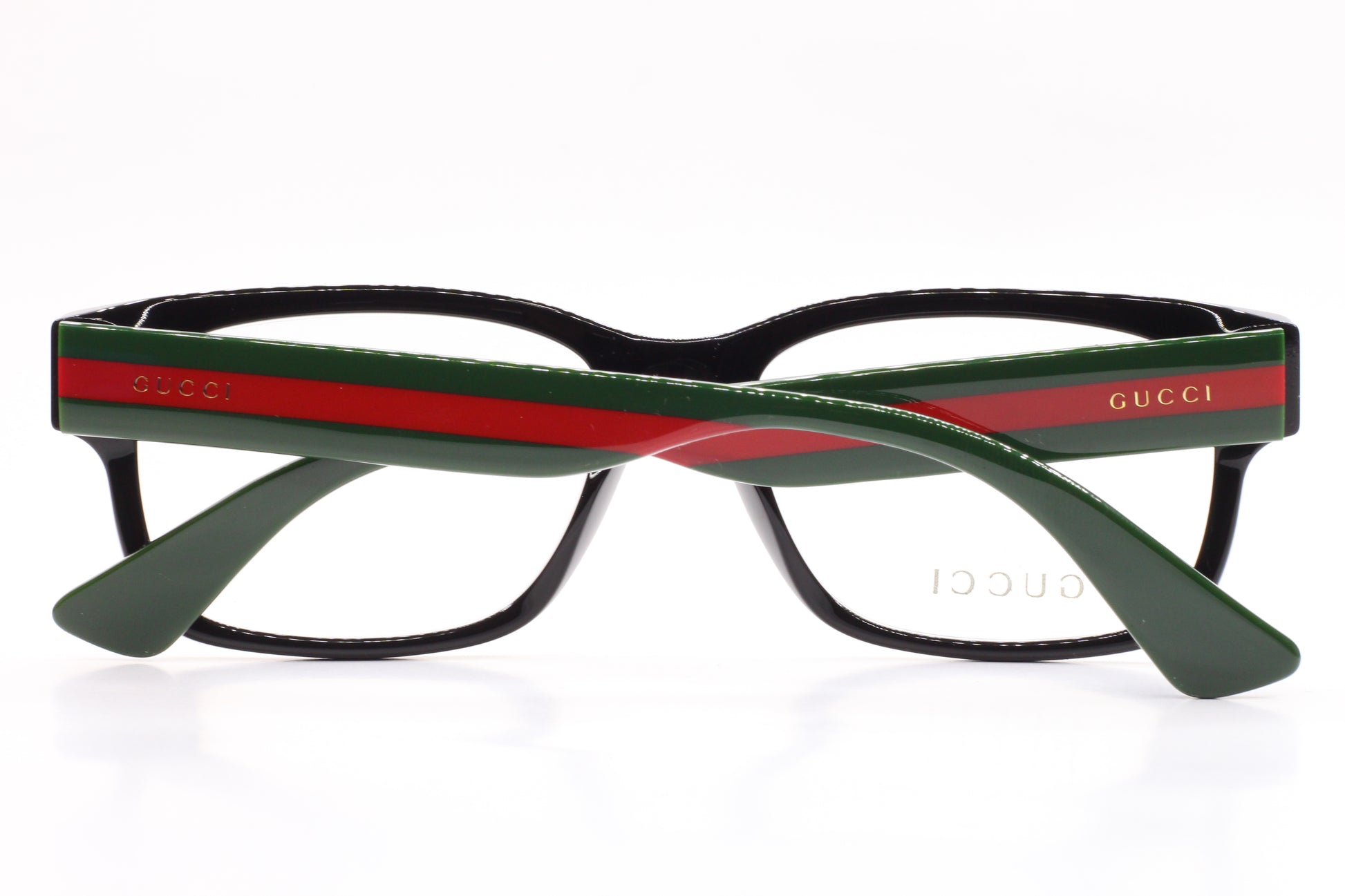 Gucci GG0343O 007 eyeglasses for sale with black frames and green red striped temples by ABC Optical