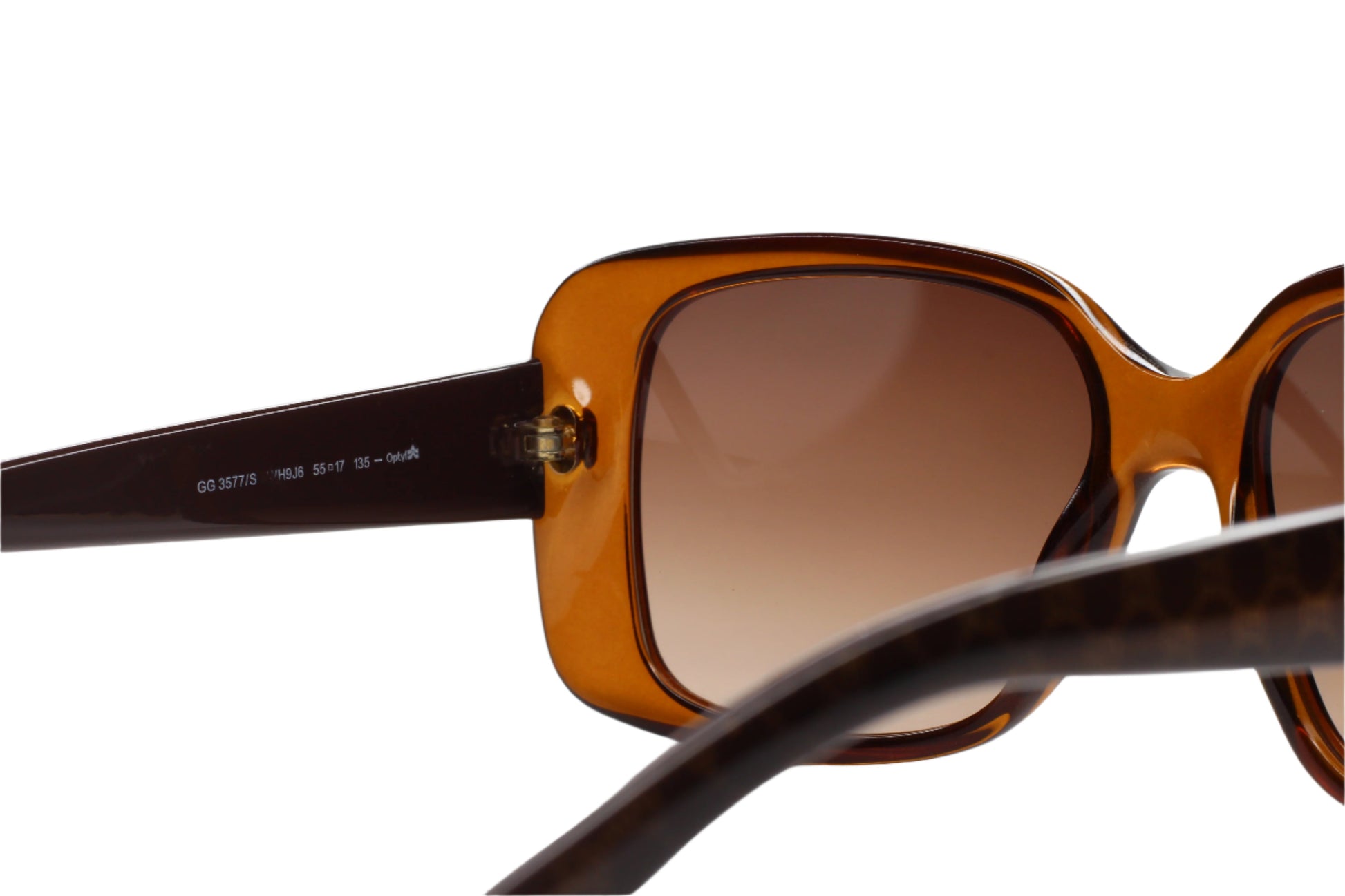 Close-up of Gucci GG3577S sunglasses for women with brown gradient lenses and tortoiseshell frames