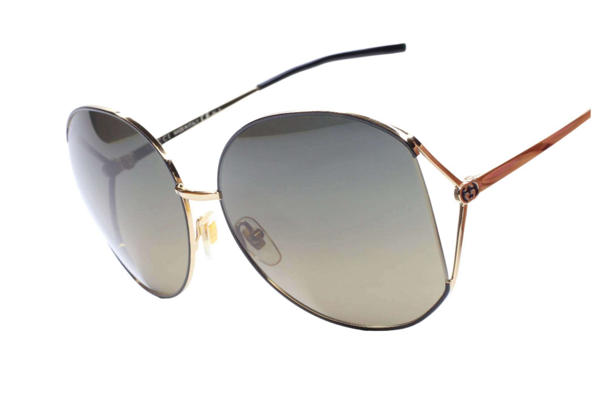Gucci gold metal sunglasses women with gradient lenses and thin frame by ABC Optical