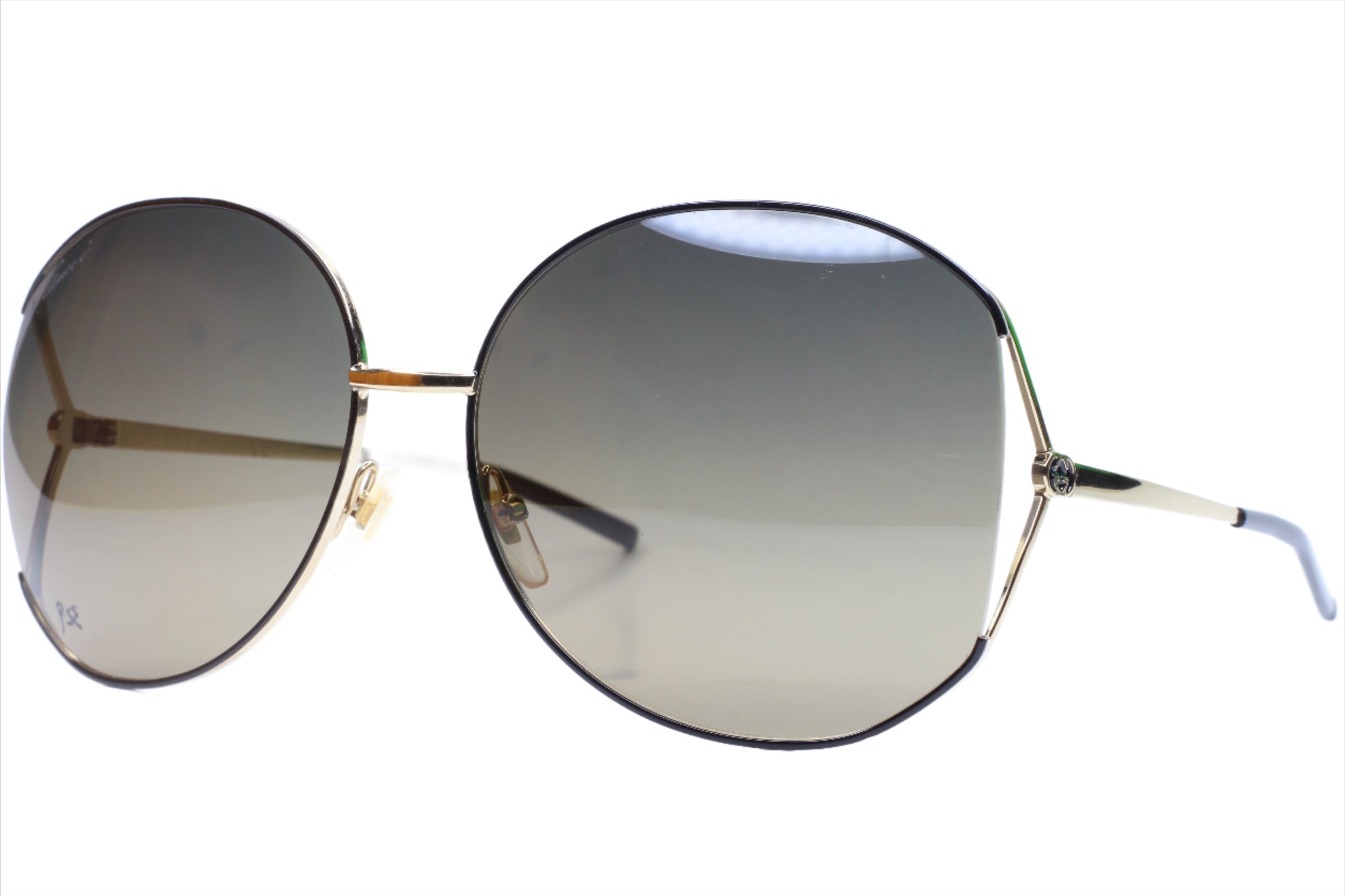 Gucci gold metal sunglasses women with oversized round gradient lenses by ABC Optical