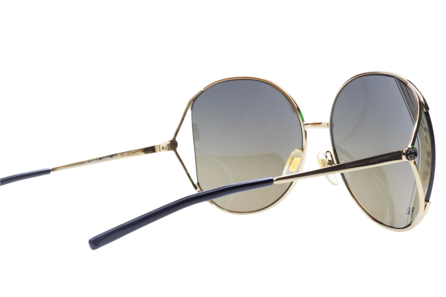Gucci gold metal sunglasses women with round gradient lenses and slim temples from ABC Optical