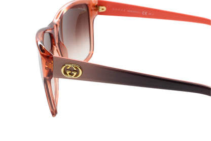 Gucci light rose crystal sunglasses with brown gradient lenses and gold logo on the temple
