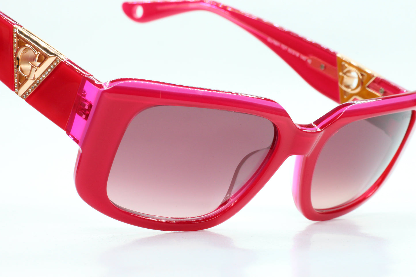 Guess pink gold sunglasses women with rectangular pink frames and gold accents by ABC Optical