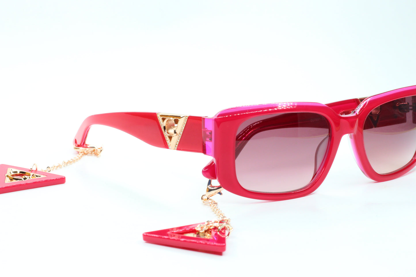 Guess pink gold sunglasses women with pink square frames and gold chain detailing by ABC Optical