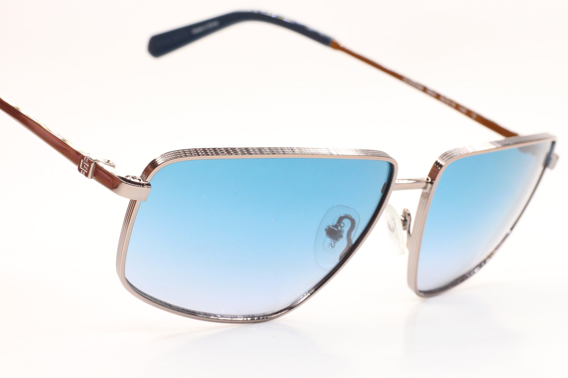 Guess silver blue gradient sunglasses with sleek metallic frame and stylish blue tinted lenses