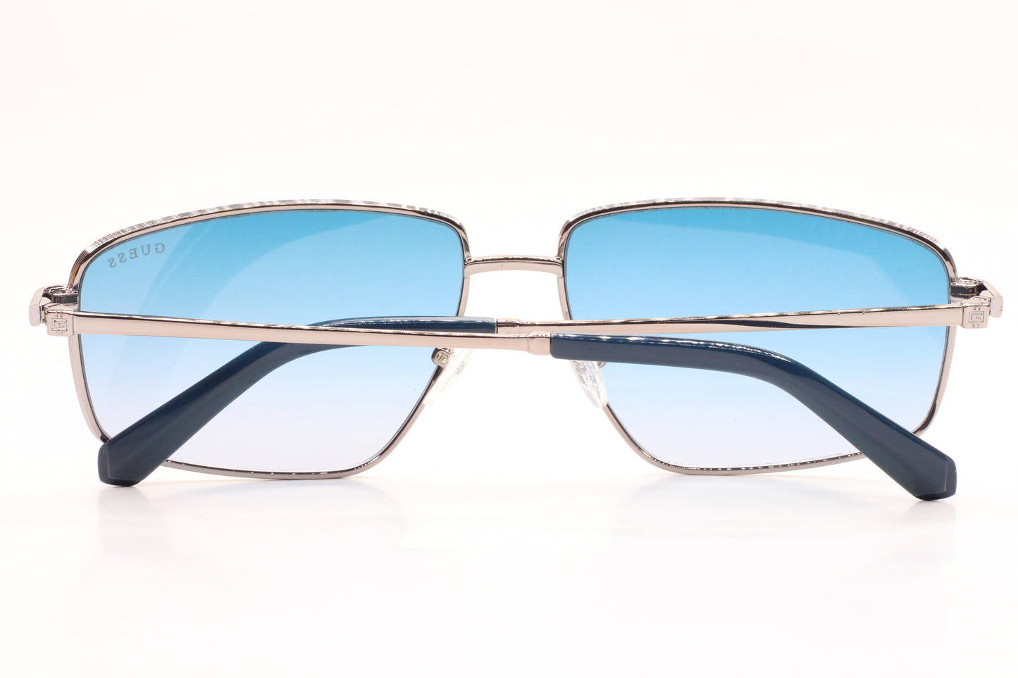 Guess silver blue gradient sunglasses with metal frame and sleek black temples by ABC Optical