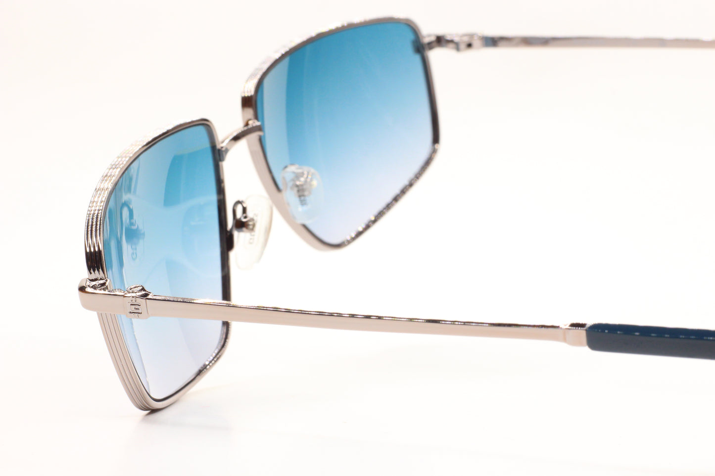 Guess silver blue gradient sunglasses by ABC Optical with stylish silver frames and blue gradient lenses