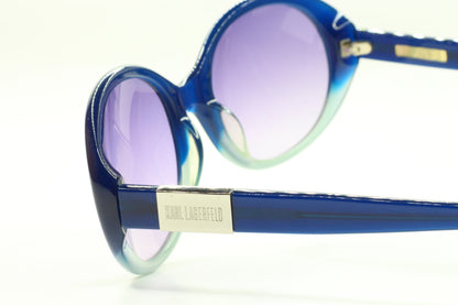Karl Lagerfeld blue gradient sunglasses with round lenses and glossy blue frames by ABC Optical