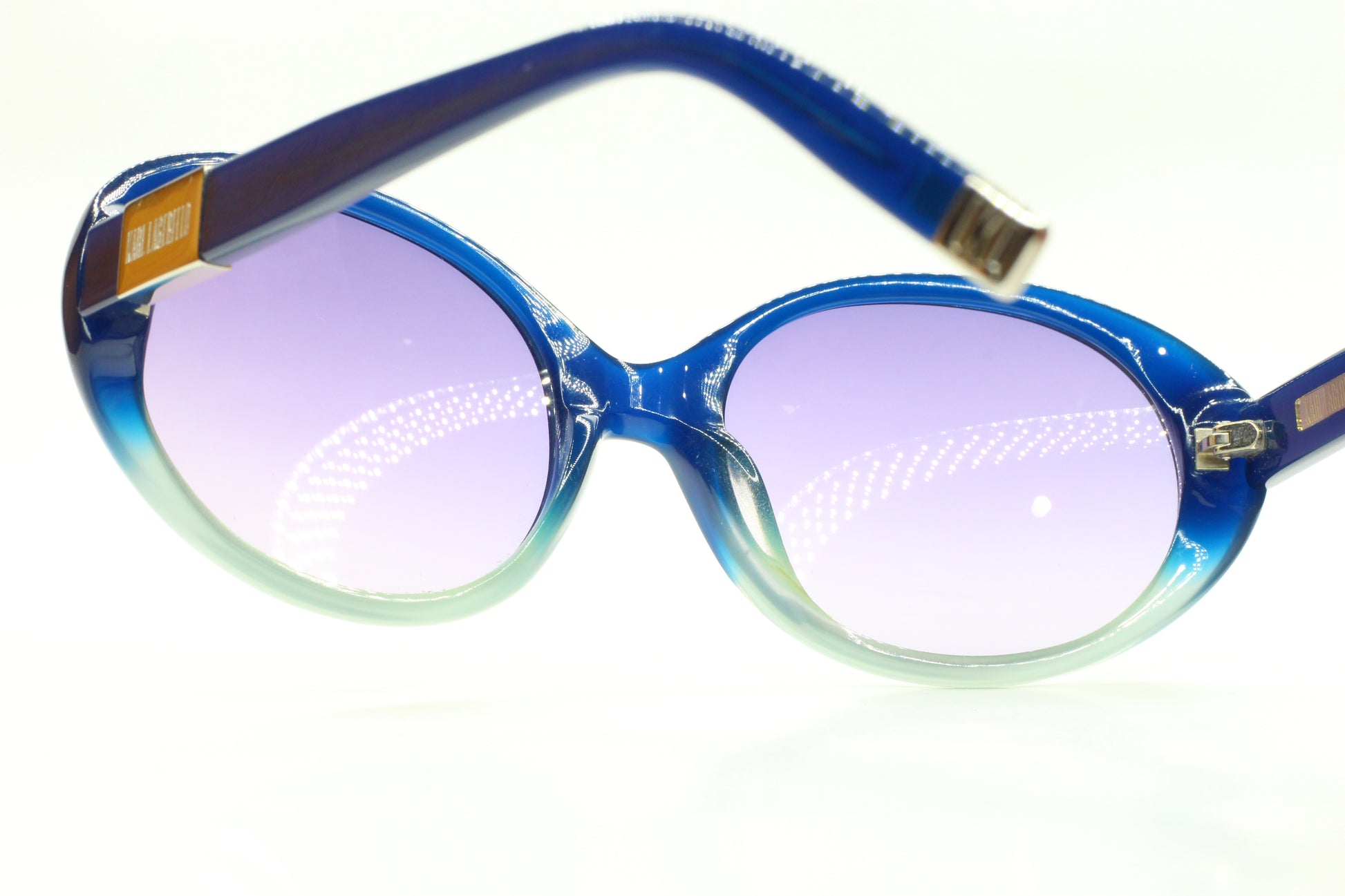 Karl Lagerfeld blue gradient sunglasses with oval optical frames and blue-green color tint