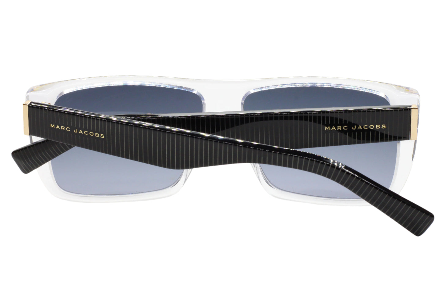 Marc Jacobs luxury clear frame sunglasses with black temples and blue lenses by ABC Optical
