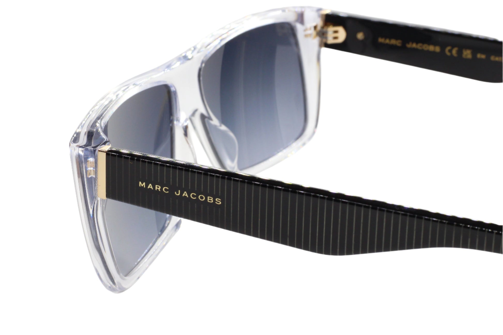 Luxury clear frame sunglasses with black striped temples and Marc Jacobs branding optical frames
