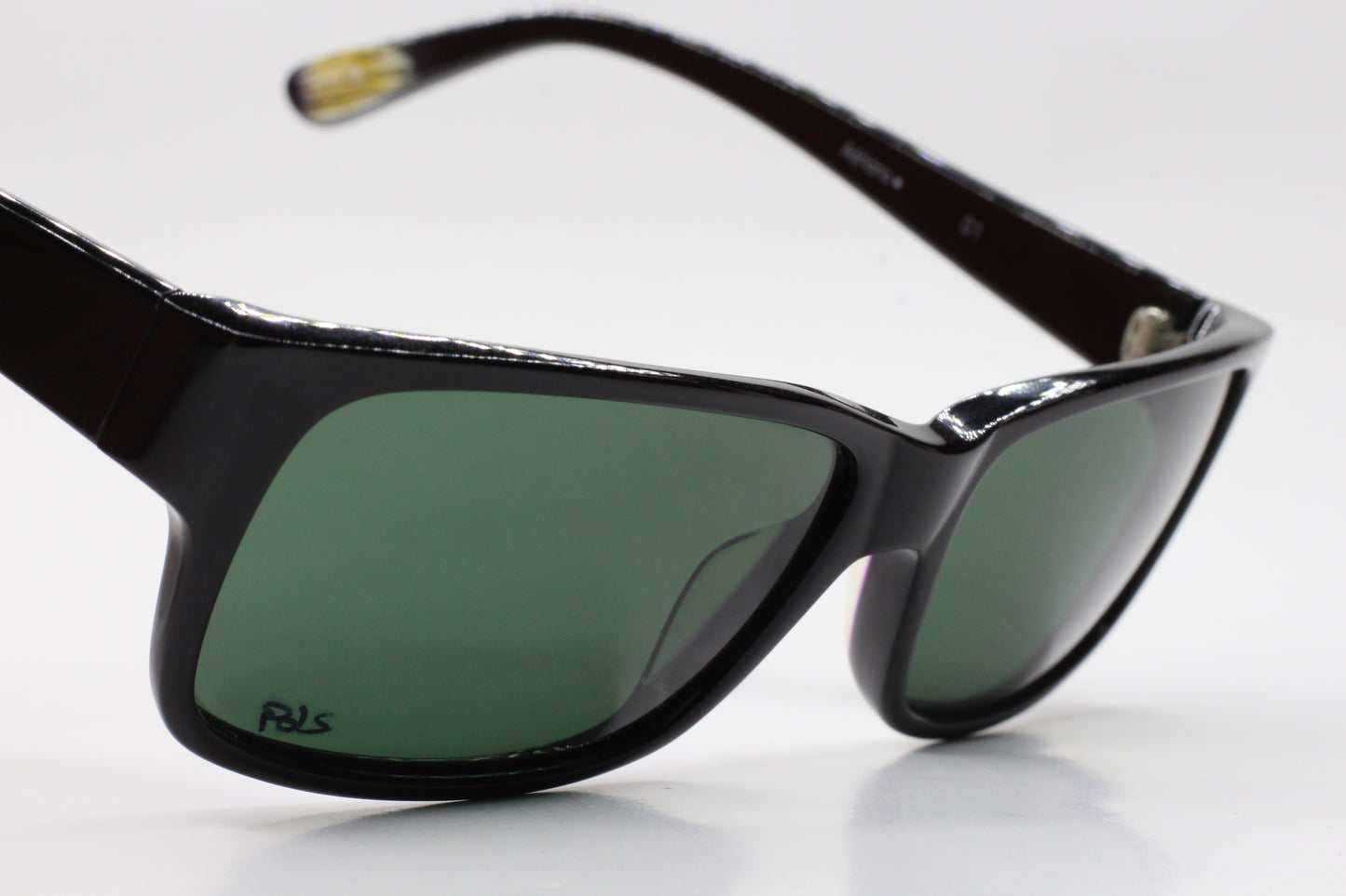 Black S&C Adriano sunglasses for sale with green polarized lenses by ABC Optical