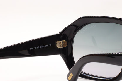 Close-up of black Tom Ford TF266 Elise sunglasses frames showing hinge and lens details