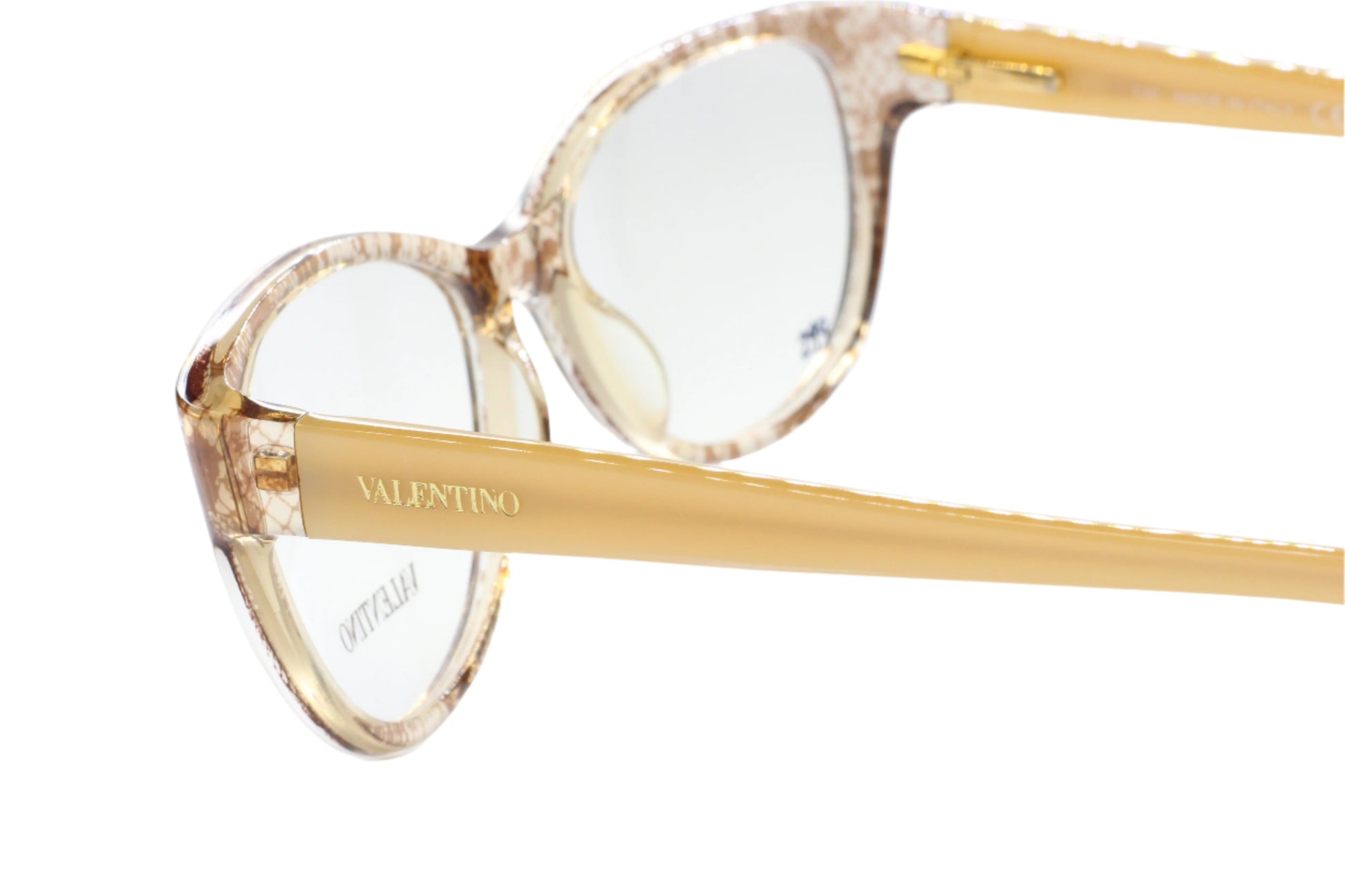 Close-up of Valentino V2630 eyeglass frames online by ABC Optical with translucent and gold temples