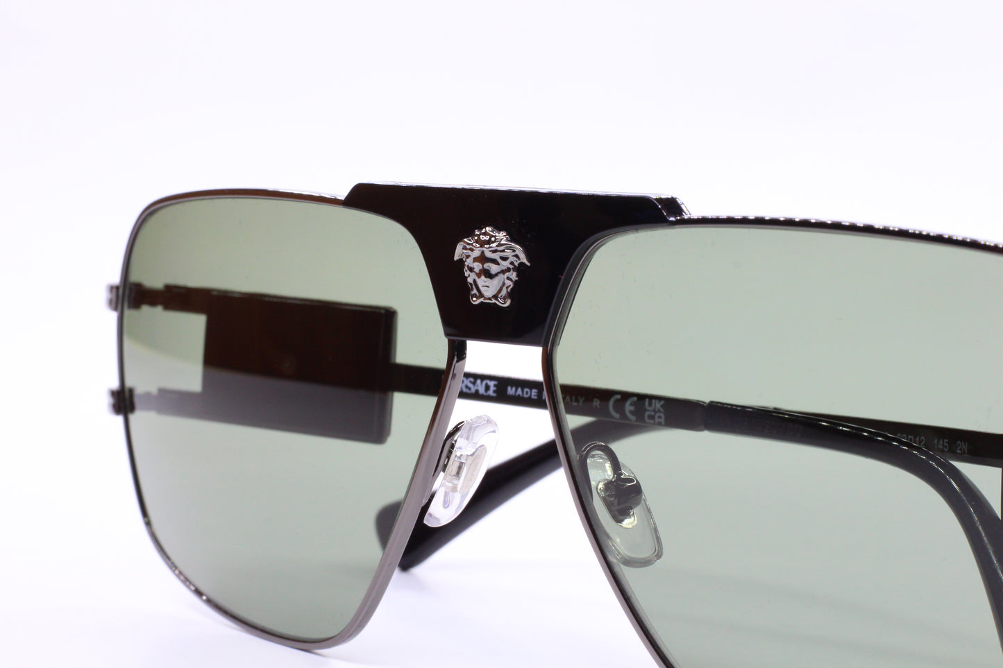 Buy authentic Versace eyewear online black optical frames with green tinted lenses from ABC Optical