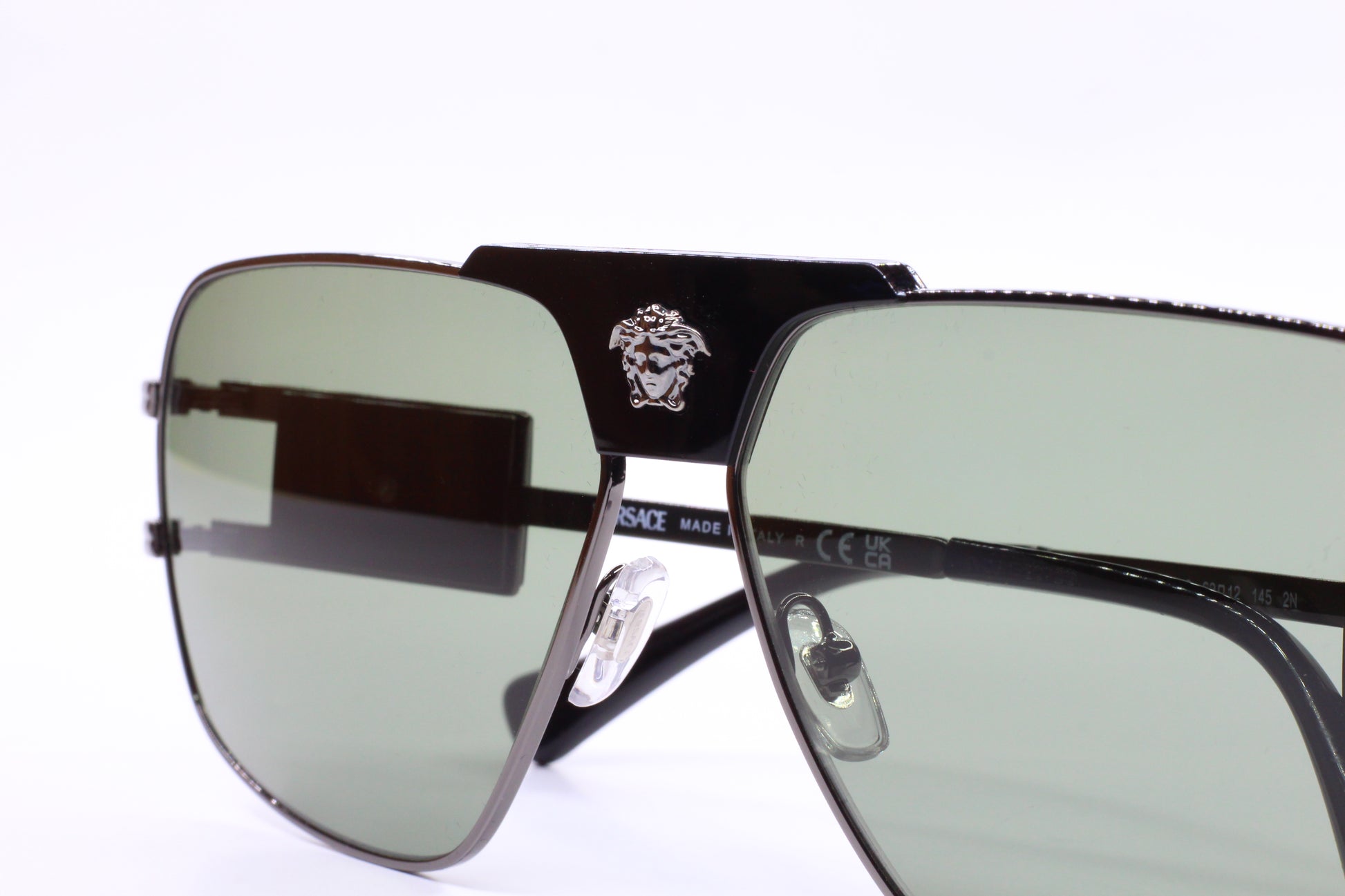 Buy authentic Versace eyewear online black optical frames with green tinted lenses from ABC Optical