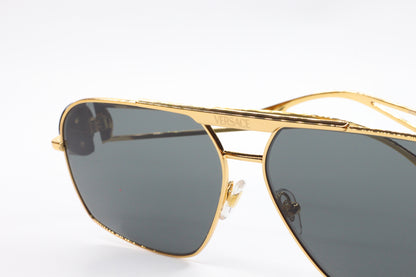 Luxury Italian designer sunglasses with gold-tone metal frames by ABC Optical