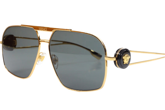 Luxury Italian designer sunglasses by ABC Optical featuring gold frames and dark lenses