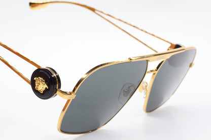 ABC Optical luxury Italian designer sunglasses with gold frame and dark lenses