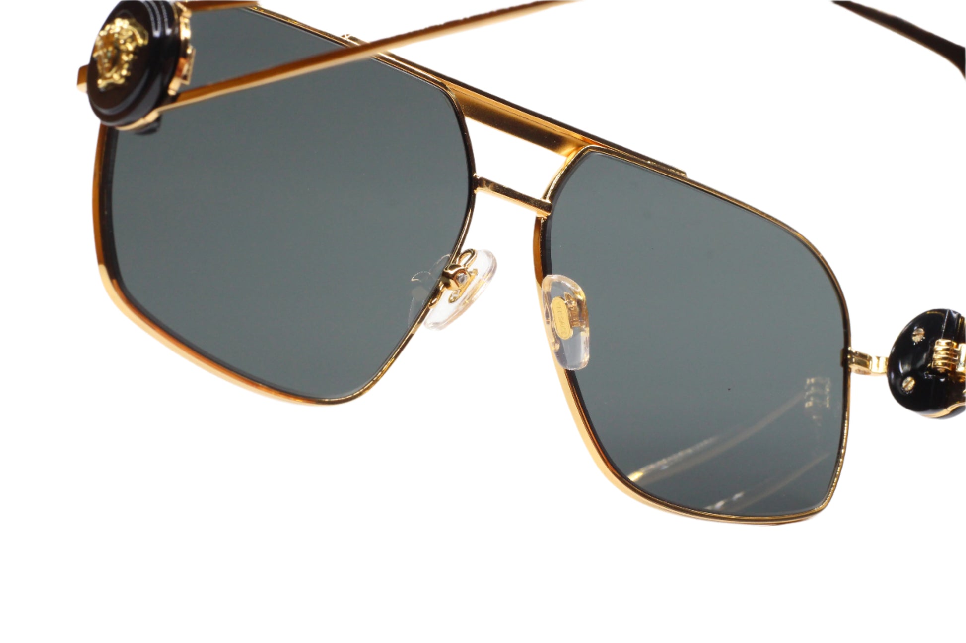 ABC Optical luxury Italian designer sunglasses with gold metal frame and dark lenses