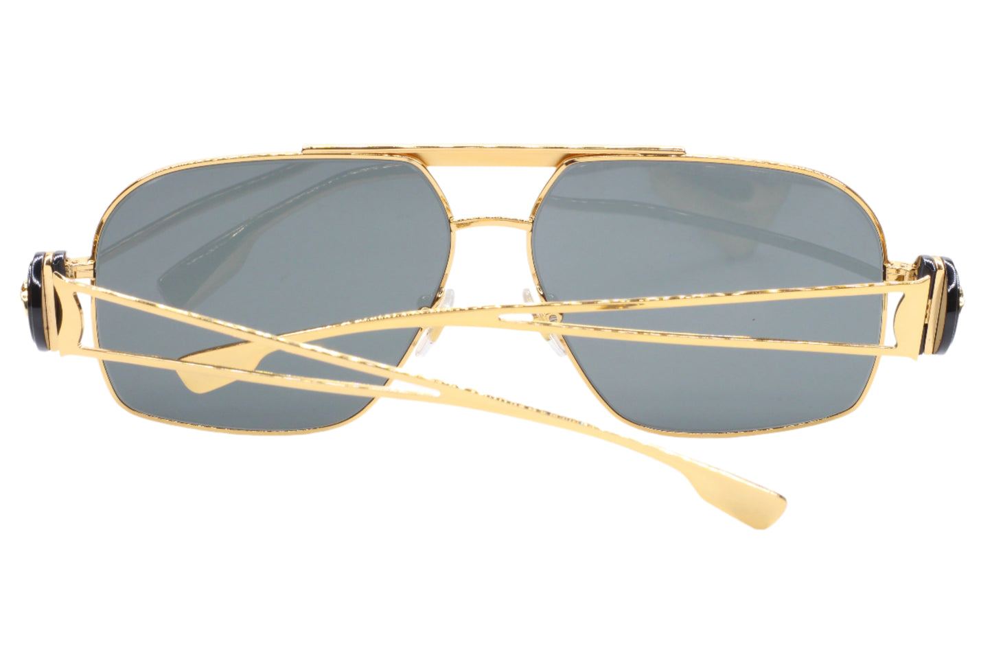 ABC Optical luxury Italian designer sunglasses with gold frame and dark tinted lenses