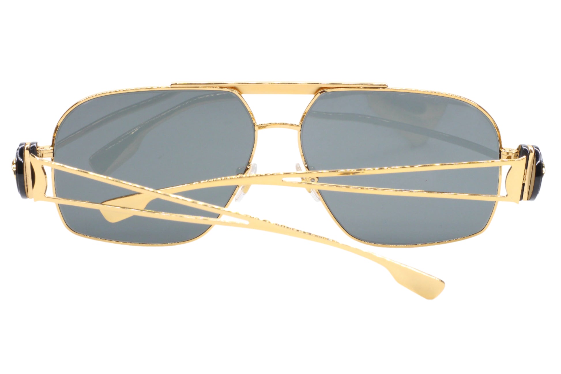 ABC Optical luxury Italian designer sunglasses with gold frame and dark tinted lenses